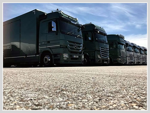 Covered car transport to a track day in Spain.